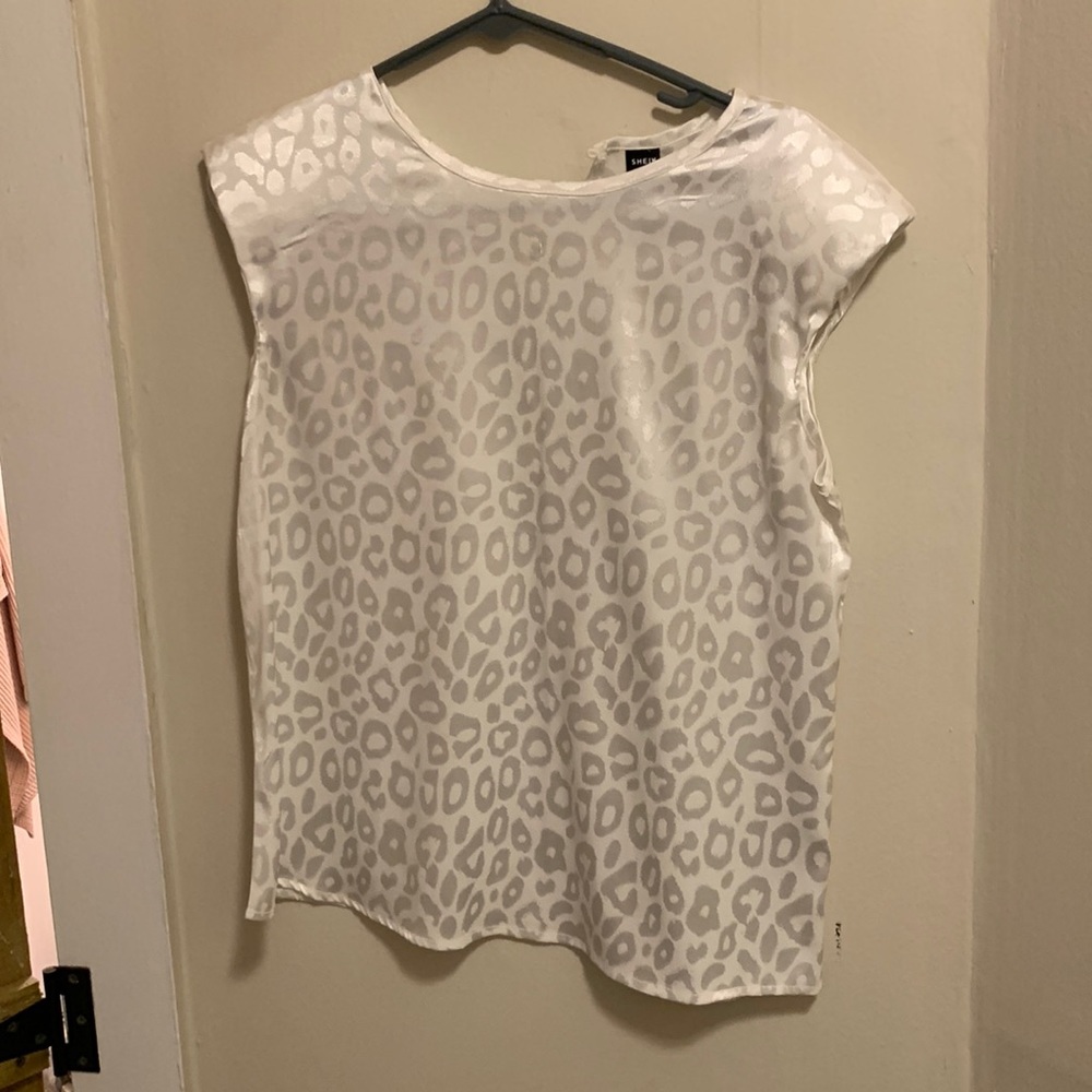 White cheetah satin blouse with button in the back